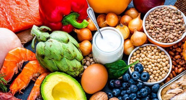 A variety of healthy food items symbolizing a balanced diet for optimal health